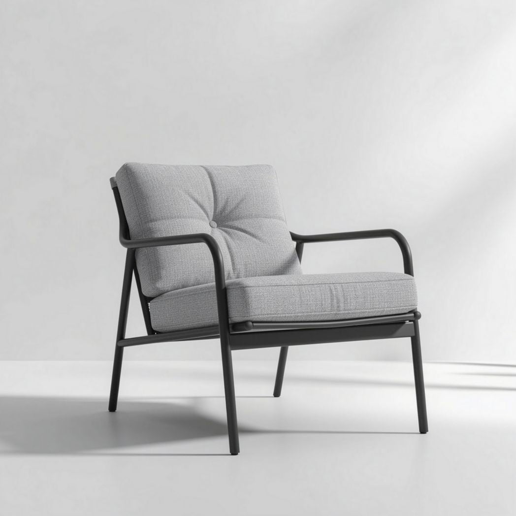 Modern outdoor lounge chair with soft gray cushion and sturdy metal frame